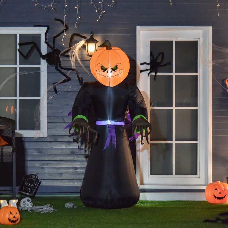 The Holiday Aisle® Halloween Pumpkin Reaper Light Up Yard